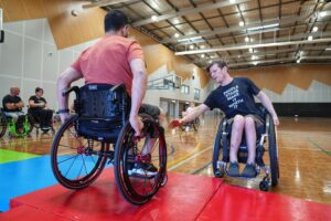 KJ van der Klooster delivering wheelchair skills training to a therapist.